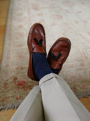Beige chinos with brown tasseled loafers 